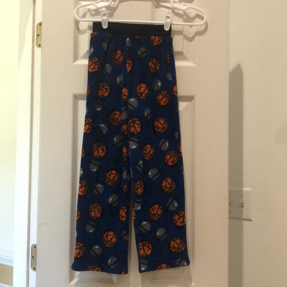 Pajama pants with basketball graphic